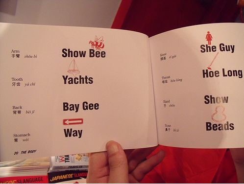 Americans learn Chinese through the aids of English letters or words. 手臂, shoubi, which means arms in English, are translated into 'Show Bee'. [File photo]