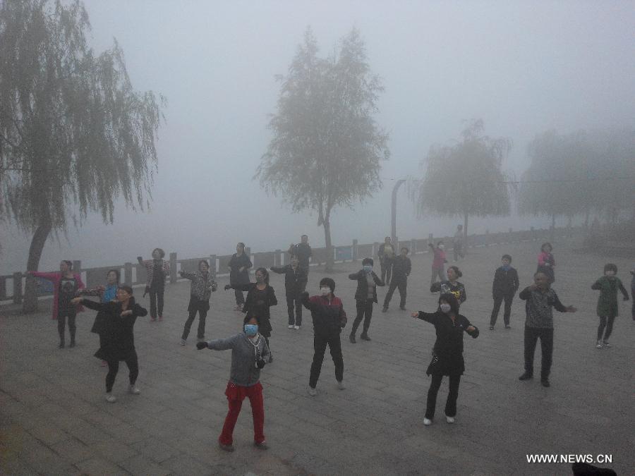 China's central observatory on Tuesday issued a yellow alert for smog to hit parts of north China, including Beijing, capital of China, on Tuesday and Wednesday. 