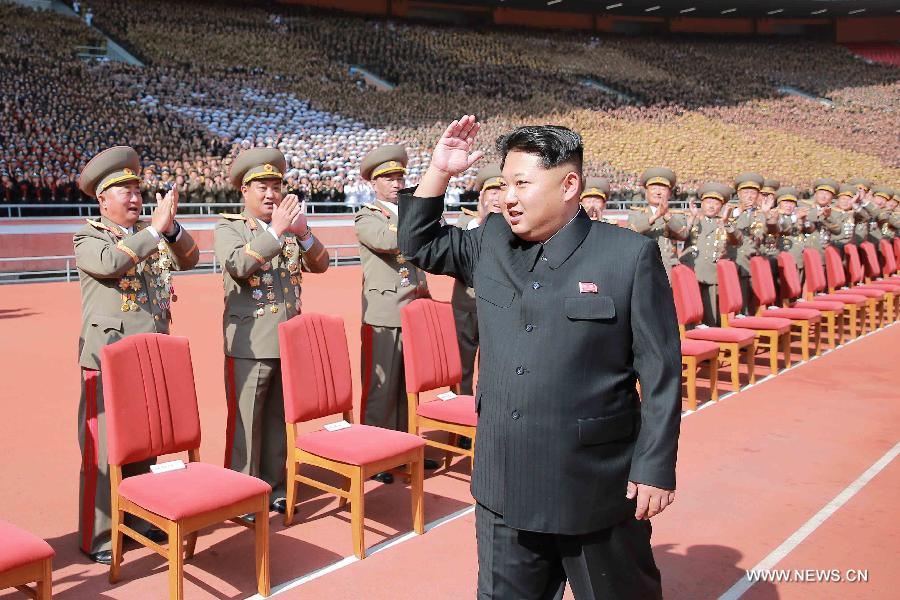 Photo provided by Korean Central News Agency (KCNA) on Oct. 14, 2015 shows top leader of the Democratic People's Republic of Korea (DPRK) Kim Jong Un recently having a photo session with the participants in the military parade celebrating the 70th anniversary of the ruling Workers' Party of Korea (WPK) in Pyongyang, capital of the Democratic People's Republic of Korea (DPRK). (Xinhua/KCNA) 