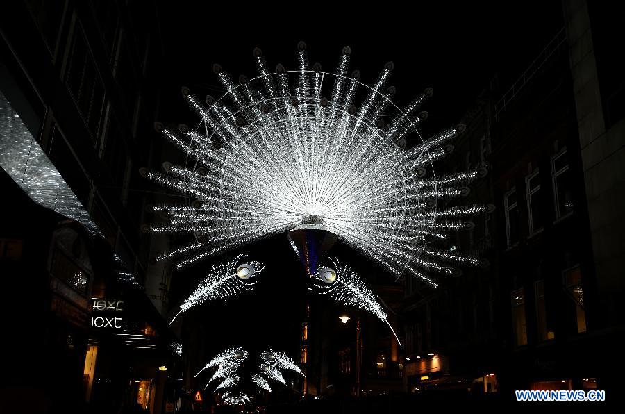 Photo taken on Nov. 19, 2014 shows the Christmas decorations on the Bond Street in London. 