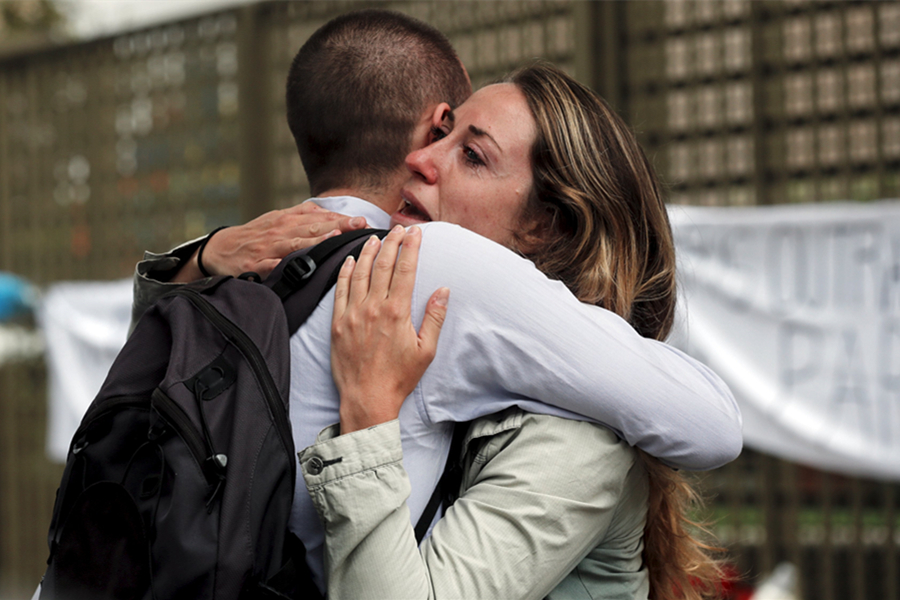 Paris attacks: Prayers, tears and candles