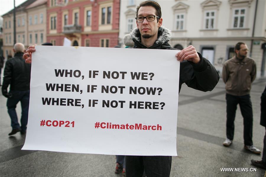 People gathered in Ljubljana's Congress Square to participate in the People's Climate March ahead of the United Nations Conference on Climate Change scheduled to be held in Paris on Monday.