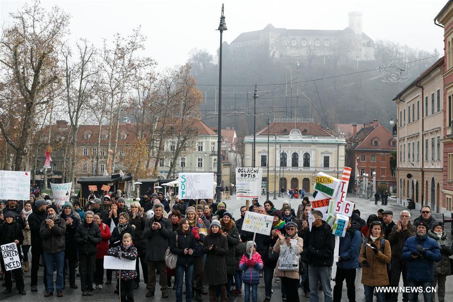 People gathered in Ljubljana's Congress Square to participate in the People's Climate March ahead of the United Nations Conference on Climate Change scheduled to be held in Paris on Monday.