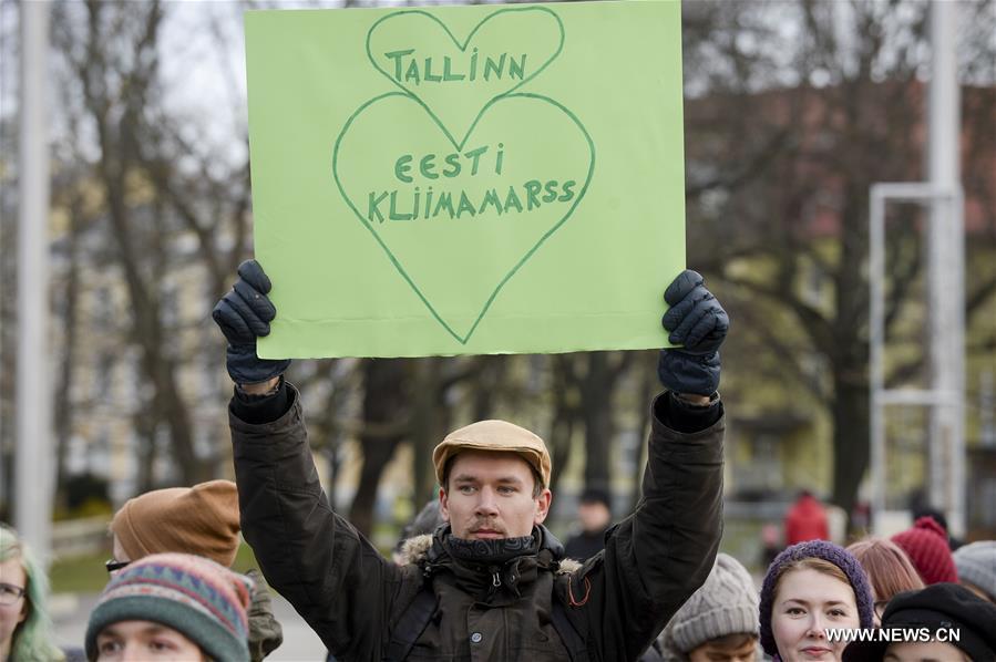 People gathered in Ljubljana's Congress Square to participate in the People's Climate March ahead of the United Nations Conference on Climate Change scheduled to be held in Paris on Monday.