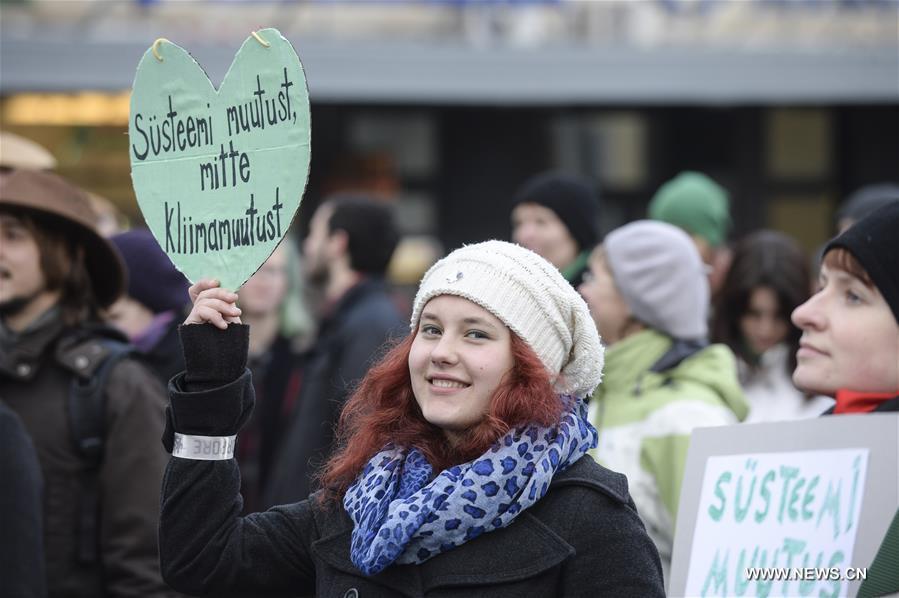 People gathered in Ljubljana's Congress Square to participate in the People's Climate March ahead of the United Nations Conference on Climate Change scheduled to be held in Paris on Monday.