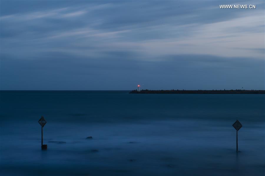 The long-exposure photo taken on Oct. 9, 2015 shows the sea in East London, South Africa. 