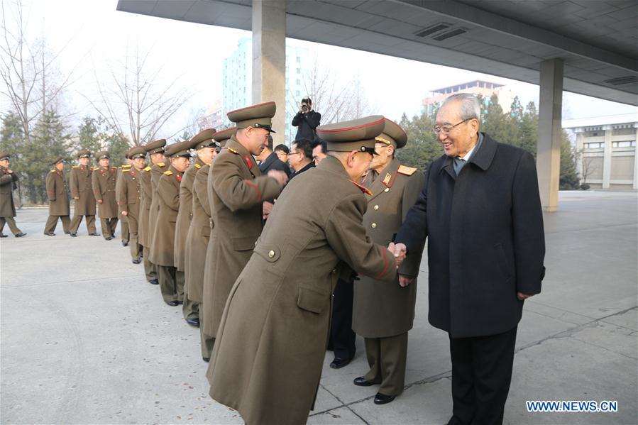  Secretary of the Central Committee of the ruling Workers' Party of Korea Kim Ki Nam (1st R) shakes hands with members of music groups in Pyongyang, DPRK, on Dec. 9, 2015. Two renowned music groups of the Democratic People's Republic of Korea (DPRK) on Wednesday left for Beijing for performances in China. (Xinhua/Guo Yina) 