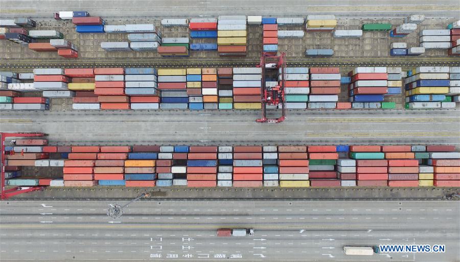 An aerial photo taken on Dec. 8, 2015 shows the Yangshan Port Container Terminal in Shanghai, east China. The throughput of the Yangshan Port Container Terminal has ranked top for consecutive five years in the world and it is designed to expand its throughput capacity to 40 million TEU (20-foot equivalent unit) by 2017. (Xinhua/Pei Xin) 