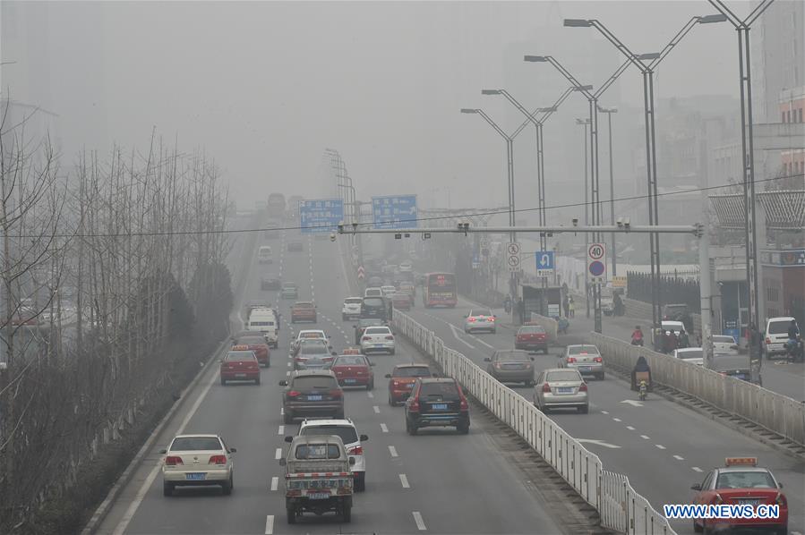 Photo taken on Dec. 10, 2015 shows the downtown area is shrouded in smog in Taiyuan, north China's Shanxi Province. 