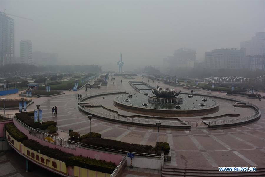 Photo taken on Dec. 10, 2015 shows the scene in smog-shrouded Jinan, capital of east China's Shandong Province.