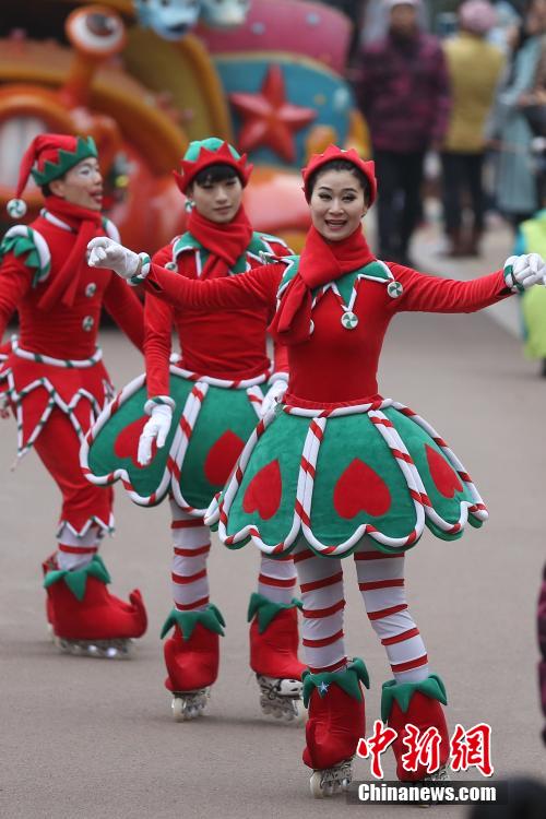 A festive parade is held on December 27, 2015 in the Changzhou Dinosaur Park in the city of Changzhou, Jiangsu Province. 