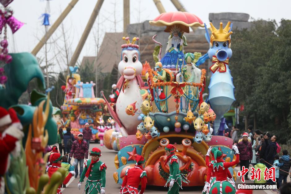 A festive parade is held on December 27, 2015 in the Changzhou Dinosaur Park in the city of Changzhou, Jiangsu Province. 