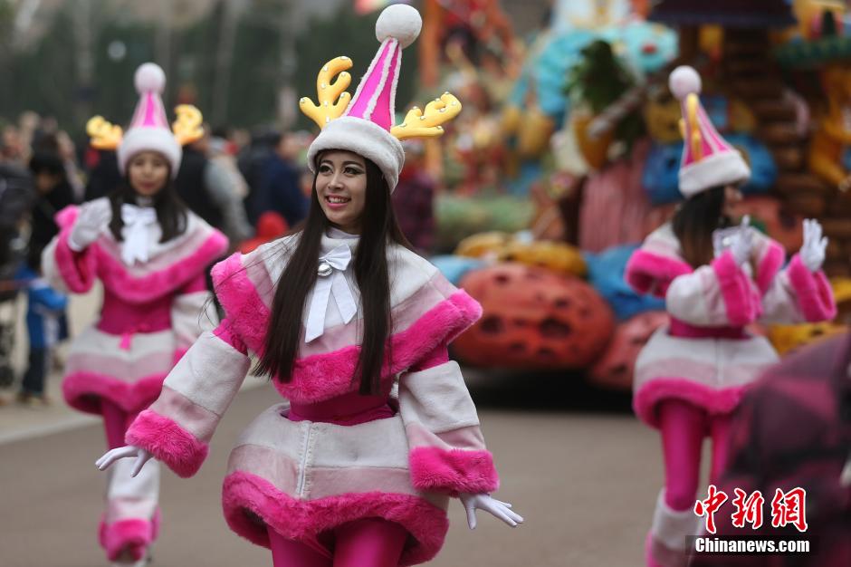 A festive parade is held on December 27, 2015 in the Changzhou Dinosaur Park in the city of Changzhou, Jiangsu Province. 