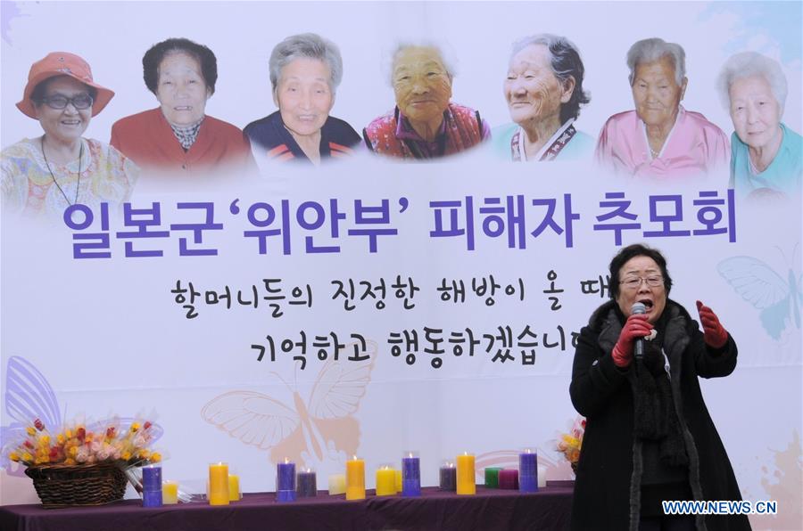 Former South Korean 'comfort women' Lee Yong-soo speaks at a weekly anti-Japan protest in front of the Japanese embassy in Seoul, South Korea, Dec. 30, 2015.