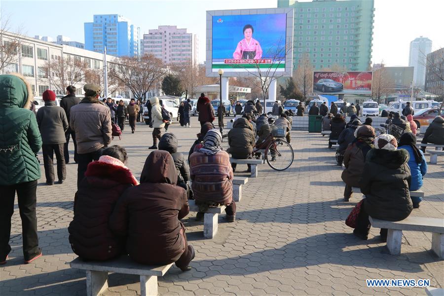 Photo taken on Jan. 6, 2016 shows Pyongyang citizens gathering in front of a big screen at Pyongyang Railway Station in Pyongyang, capital of the Democratic People's Republic of Korea (DPRK), to follow news report on the hydrogen bomb test. 