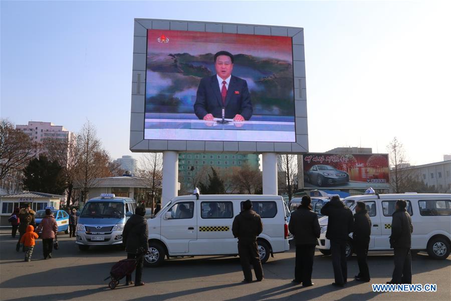 Photo taken on Jan. 6, 2016 shows Pyongyang citizens gathering in front of a big screen at Pyongyang Railway Station in Pyongyang, capital of the Democratic People's Republic of Korea (DPRK), to follow news report on the hydrogen bomb test. 