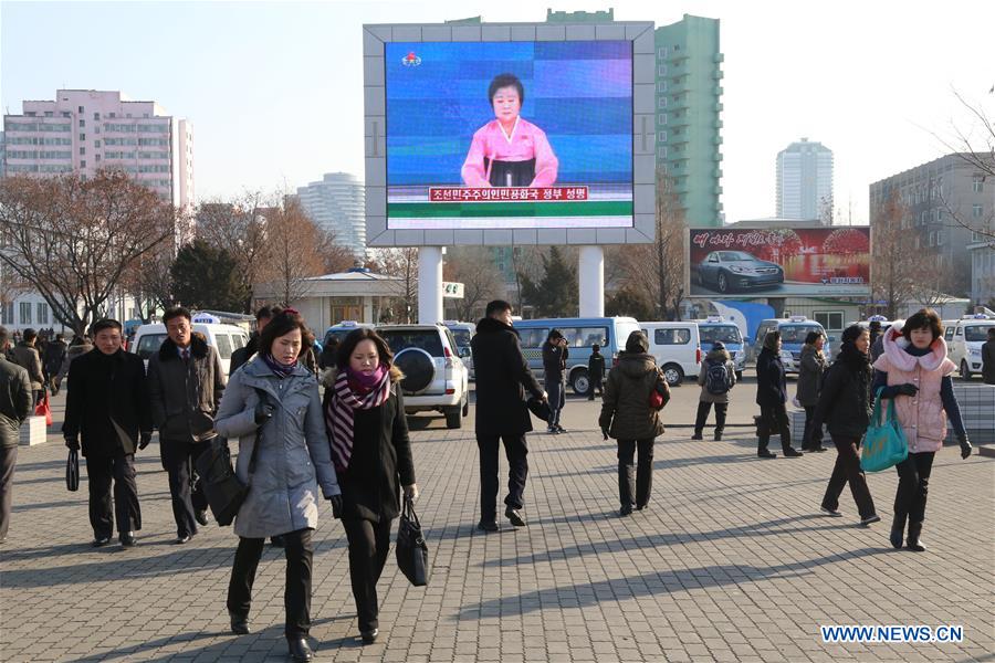 Photo taken on Jan. 6, 2016 shows Pyongyang citizens gathering in front of a big screen at Pyongyang Railway Station in Pyongyang, capital of the Democratic People's Republic of Korea (DPRK), to follow news report on the hydrogen bomb test. 