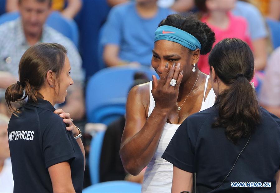 Serena Williams (C) of the United States cries after quiting the women's singles match against Jarmila Wolfe of Australia at Hopman Cup in Perth, Australia, on Jan. 5, 2016. 