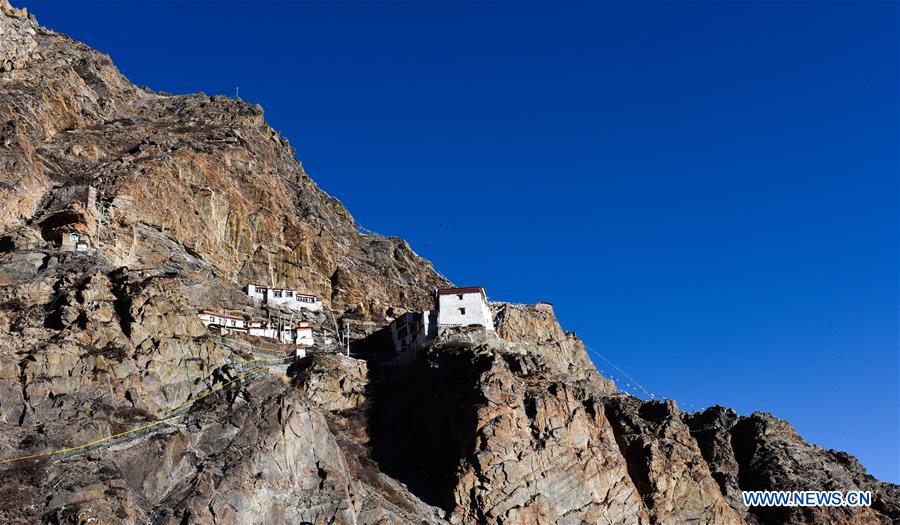 Photo taken on Jan. 4, 2016 shows Cagar Monastery on the mountain in Jilung Township of Jilung County, Xigaze City, southwest China's Tibet Autonomous Region. Cagar Monastery was built in the year of 1160, and it is one of the places that Milarepa, the Kagyu master, practising Tibetan Buddhism.