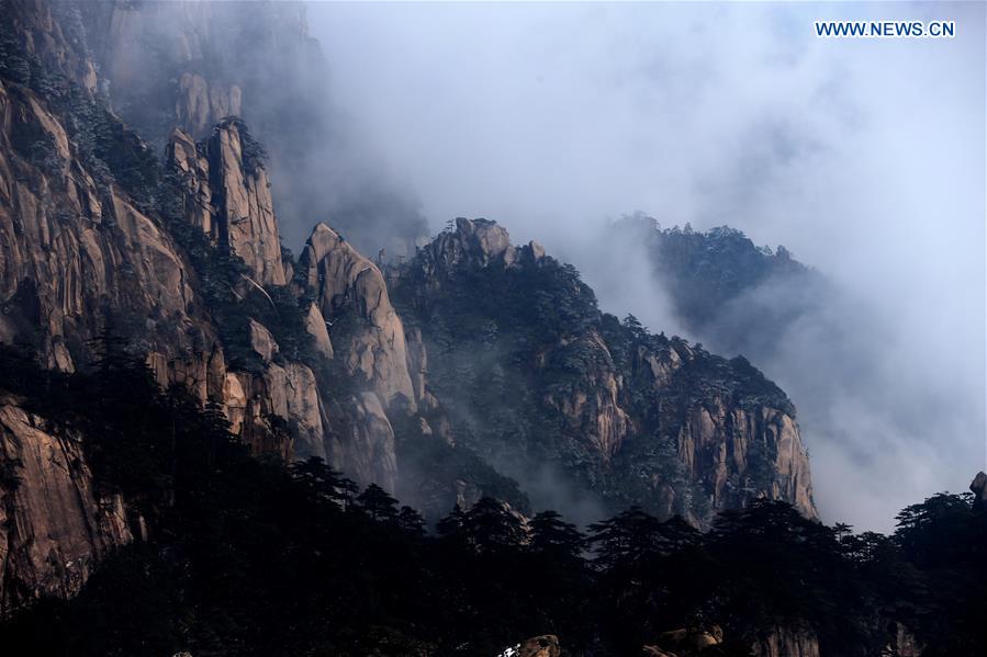 Photo taken on Jan. 13, 2016 shows the sea of clouds after a snowfall at the Huangshan Mountain scenic spot in Huangshan City, east China's Anhui Province. 