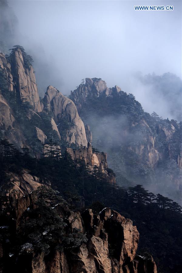 Photo taken on Jan. 13, 2016 shows the sea of clouds after a snowfall at the Huangshan Mountain scenic spot in Huangshan City, east China's Anhui Province.