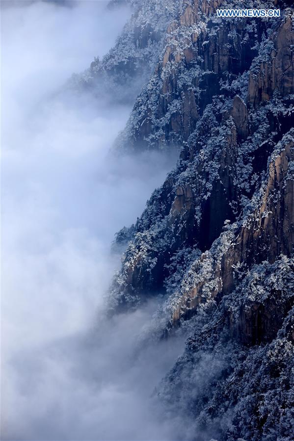 Photo taken on Jan. 13, 2016 shows the sea of clouds after a snowfall at the Huangshan Mountain scenic spot in Huangshan City, east China's Anhui Province.