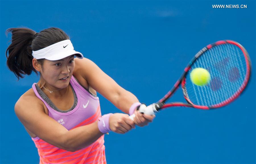 Wang Yafan of China returns the ball during the women's singles second round of Australian Open qualifying match against Alize Lim of France at Melbourne Park in Melbourne, Australia, Jan. 15, 2016. 