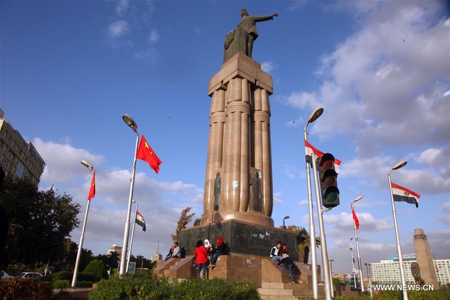 Chinese and Egyptian national flags are seen along the streets in Cairo, capital of Egypt, Jan. 19, 2016