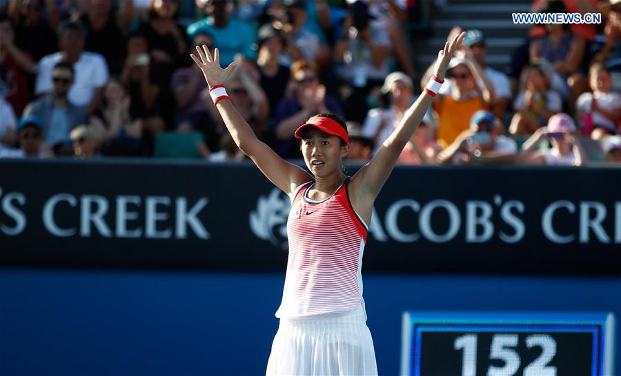 China's Zhang Shuai celebrates during the second round match of women's singles at the Australian Open Tennis Championships in Melbourne, Australia, Jan. 21, 2016.