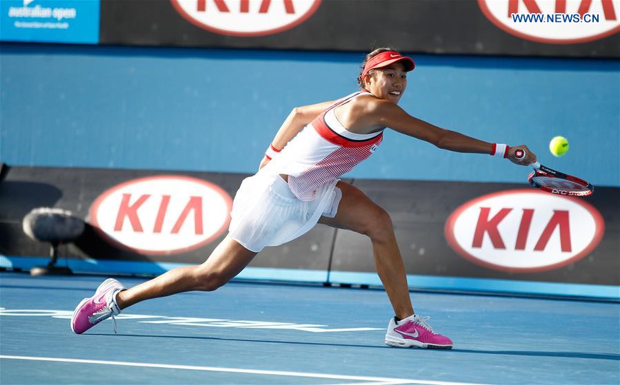 China's Zhang Shuai competes against Alize Cornet during the second round match of women's singles at the Australian Open Tennis Championships in Melbourne, Australia, Jan. 21, 2016. 