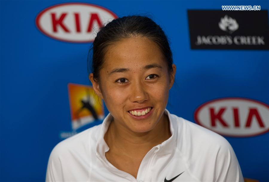 China's Zhang Shuai speaks at a press conference after winning her second round match of women's singles of Australian Open Tennis Championships against Alize Cornet of France in Melbourne, Australia, Jan. 21, 2016. 