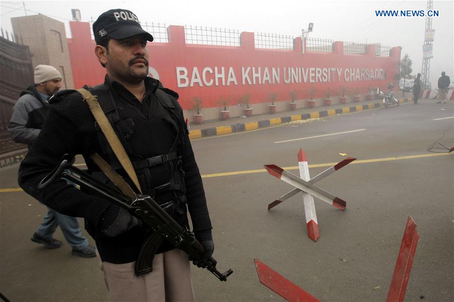 A Pakistani policeman stands guard outside the Bacha Khan University in Charsadda, northwest Pakistan, Jan. 25, 2016.