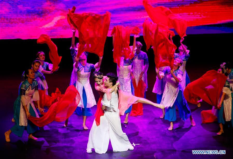 Artists perform in a traditional Chinese dance drama entitled 'The Silk Road on the Sea', in Brussels, capital of Belgium, Jan. 26, 2016.