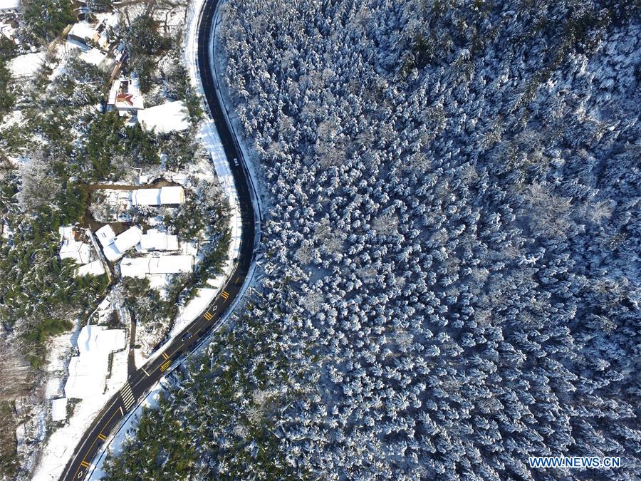 Photo taken on Feb. 2, 2016 shows the Lingfeng scenic spot after a snowfall in Anji County, east China's Zhejiang Province. A snowfall hit the county from Jan. 31.