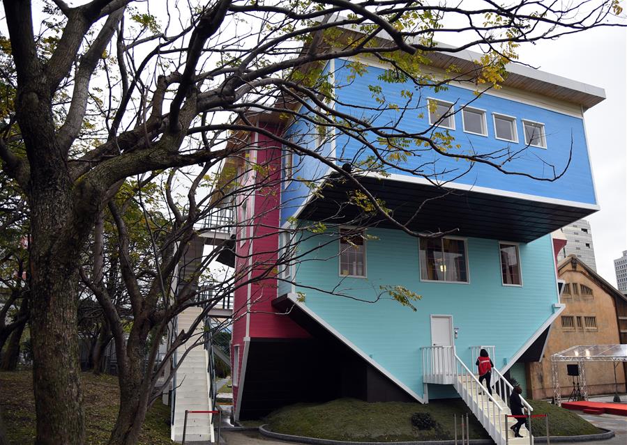TAIPEI, Feb. 5, 2016 (Xinhua) -- A two-storey upside-down house is seen at 1914 Culture Park in Taipei, southeast China's Taiwan, Feb. 5, 2016. The items and layout in the two-storey house are all placed upside down. (Xinhua/Wu Ching-teng) 