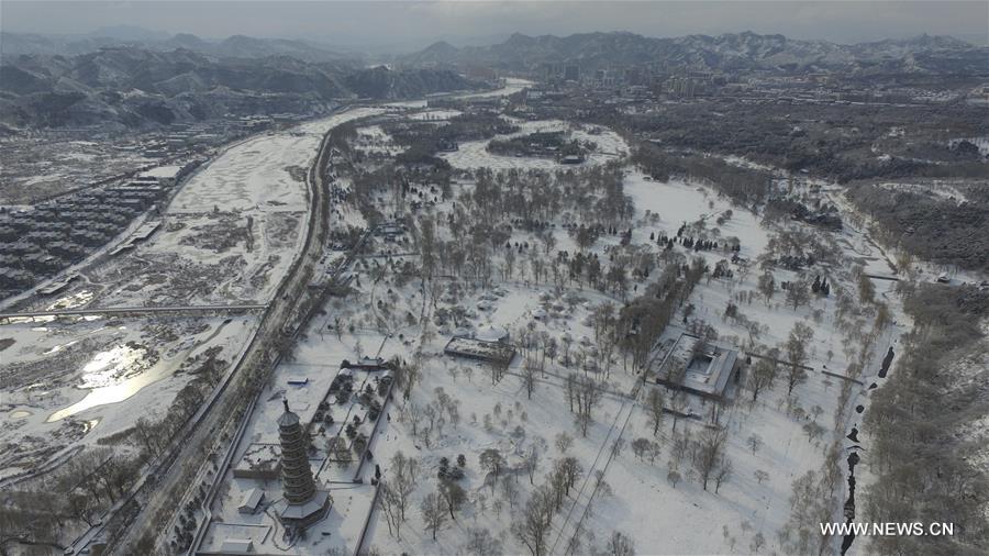Aerial photo taken on Feb. 13, 2016 shows the snow scenery at the Summer Resort in Chengde, north China's Hebei Province. 