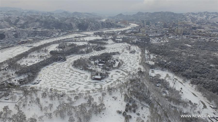 Aerial photo taken on Feb. 13, 2016 shows the snow scenery at the Summer Resort in Chengde, north China's Hebei Province. 