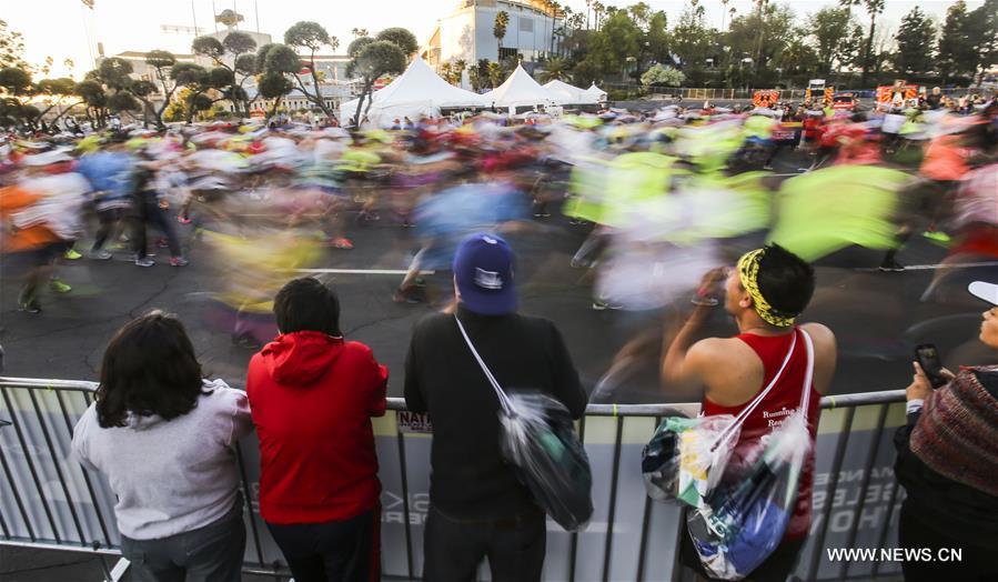 More than 25,000 runners from all 50 states and 62 countries and regions participated in the 26.2-mile event, which began at Los Angeles Dodger Stadium and went through Los Angeles, West Hollywood and Beverly Hills and ended in Santa Monica