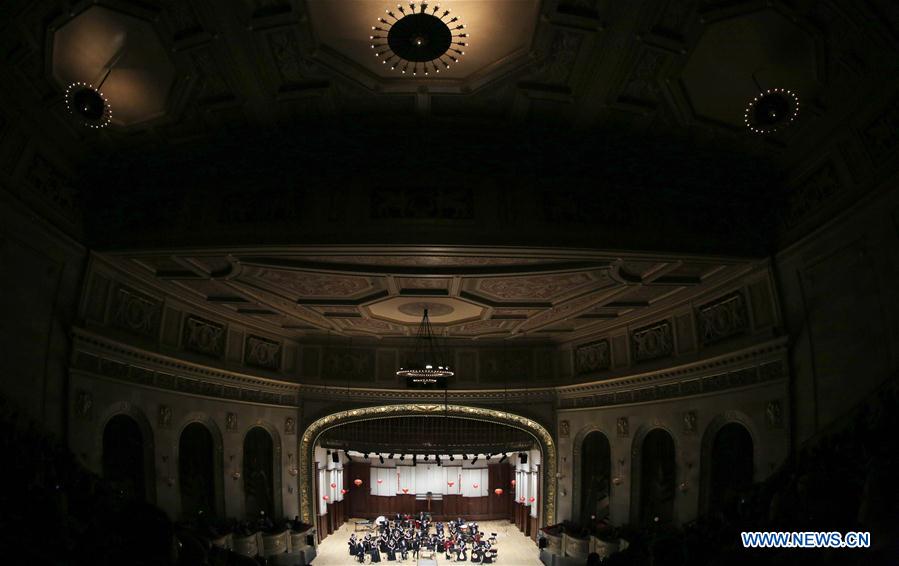 Members of China Radio Nationalities Orchestra perform during a concert at the Orchestra Hall in Detroit, the United States, Feb. 22, 2016. 