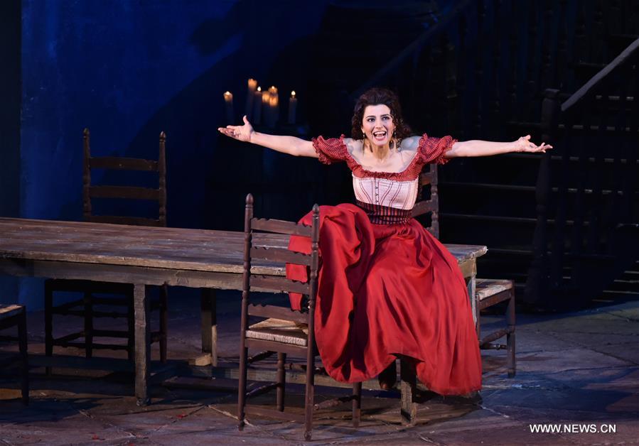  Itanlian singer Giuseppina Piunti acting as Carmen performs at the opera Carmen at the National Center for the Performing Art in Beijing, capital of China, Feb. 27, 2016