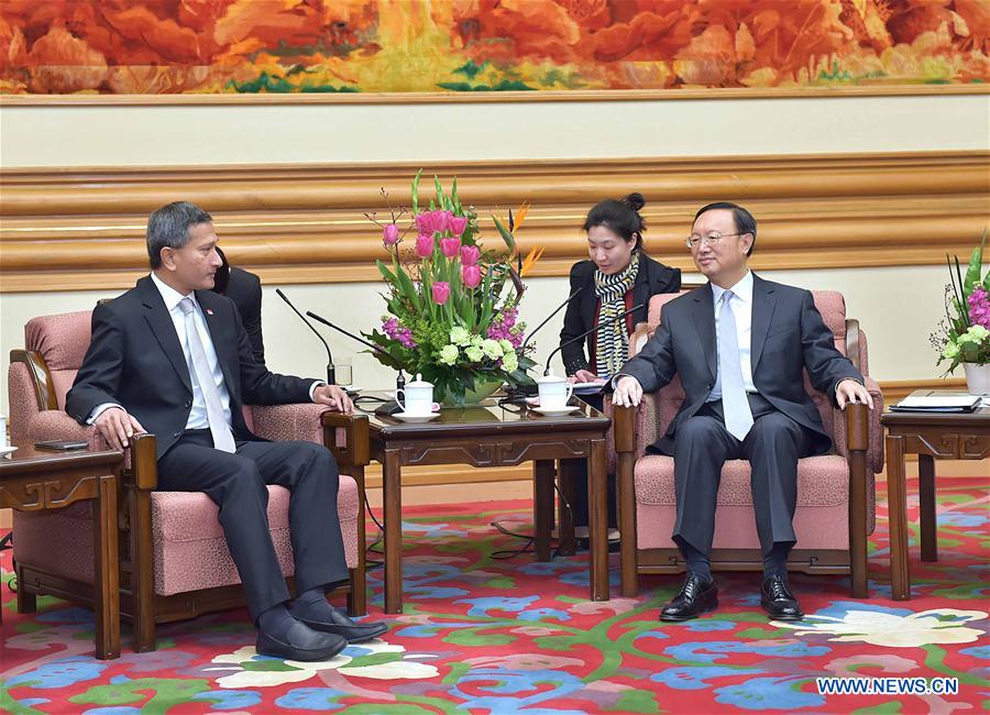 Chinese State Councilor Yang Jiechi (R) meets with Singapore's Minister for Foreign Affairs Vivian Balakrishnan in Beijing, capital of China, March 1, 2016. 