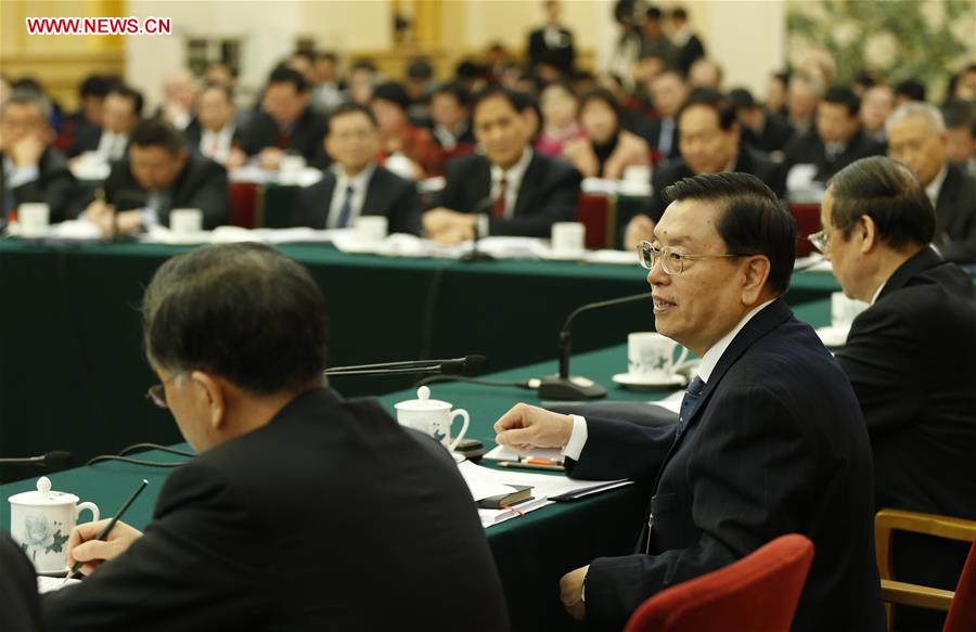 BEIJING, March 7, 2016 (Xinhua) -- Zhang Dejiang (2nd L), chairman of the Standing Committee of China's National People's Congress (NPC), joins a group deliberation of deputies from Anhui Province to the annual session of the NPC in Beijing, capital of China, March 7, 2016. (Xinhua/Ju Peng)