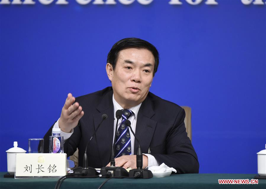 Liu Changming, a member of the 12th National Committee of the Chinese People's Political Consultative Conference, answers questions at a press conference on the development of people's livelihood in Beijing, capital of China, March 9, 2016. 