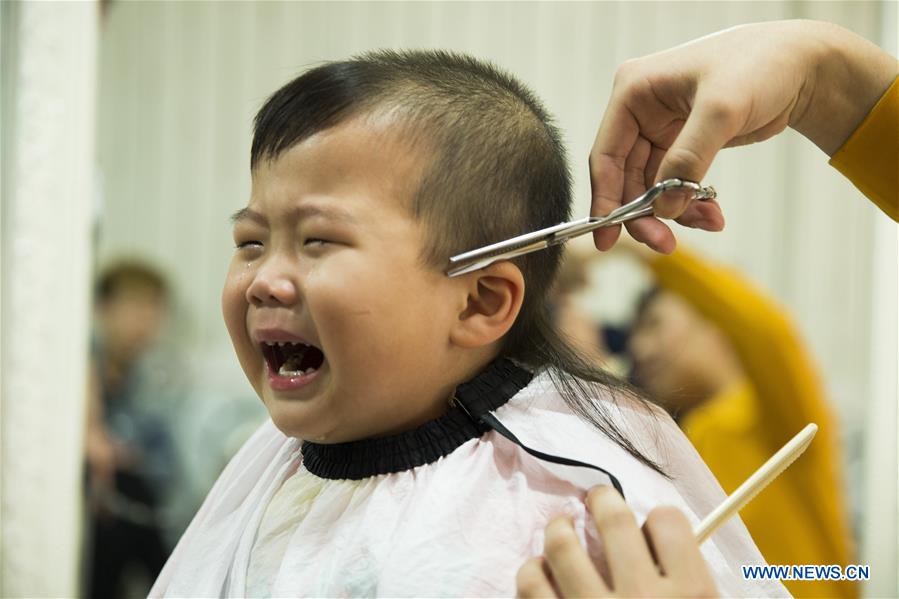 Chinese People Mark Longtaitou Festival With Haircut 3