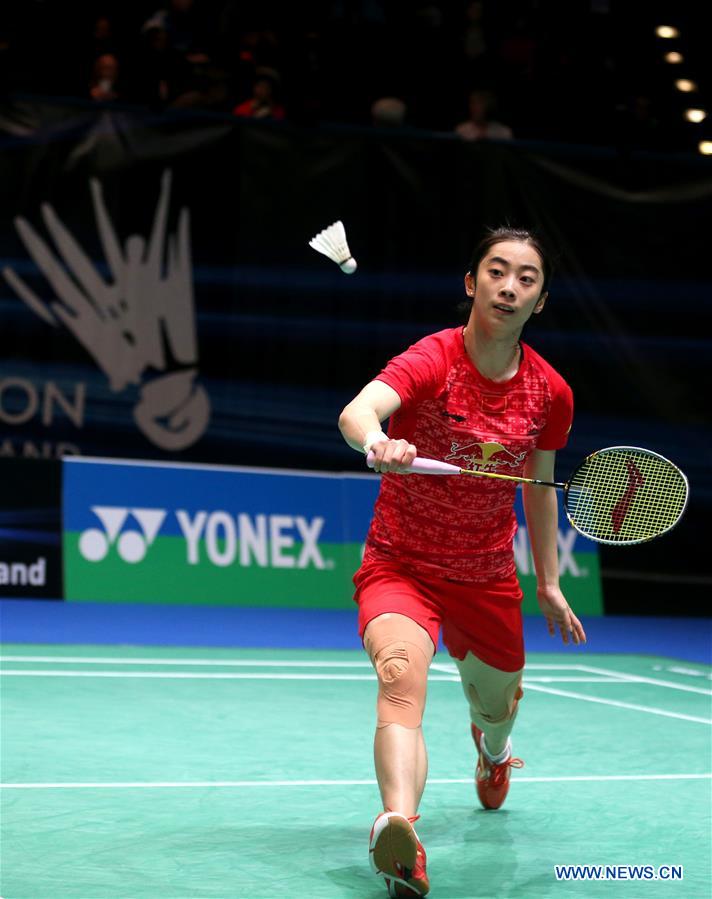 China's Wang Shixian competes during the women's singles second round match with Beiwen Zhang of the United States at the 2016 YONEX All England Open Badminton Championships in Birmingham, Britain on March 10, 2016. 