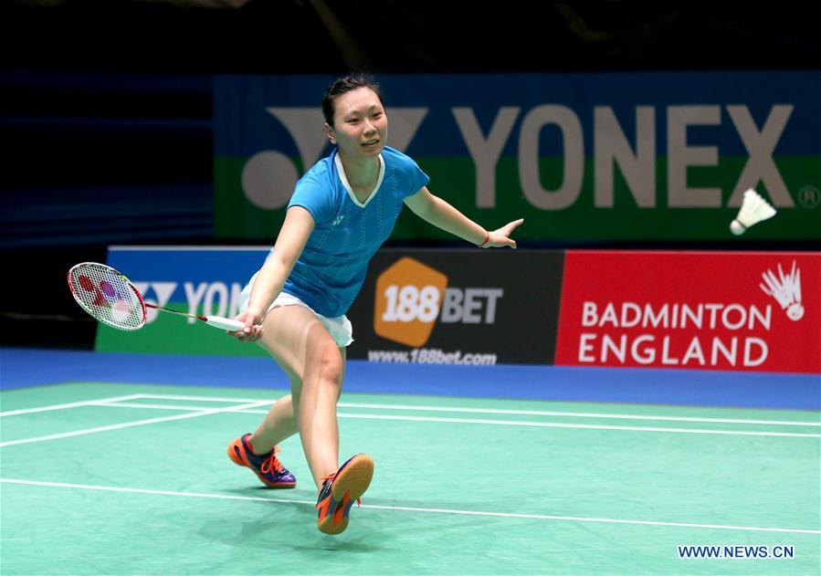 Beiwen Zhang of the United States competes during the women's singles second round match with China's Wang Shixian at the 2016 YONEX All England Open Badminton Championships in Birmingham, Britain on March 10, 2016. 