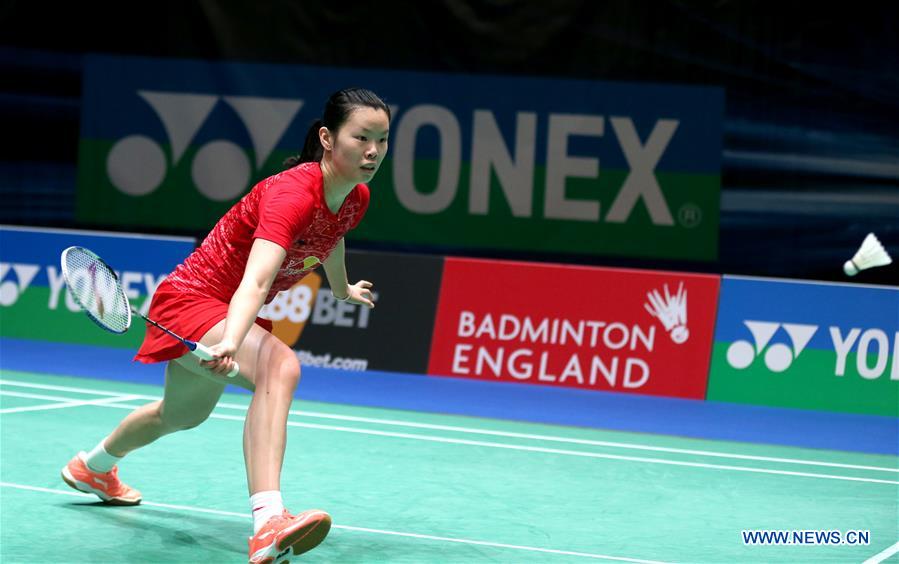 China's Li Xuerui returns the shuttlecock during the women's singles second round match with Porntip Buranaprasertsuk of Thailand at the 2016 YONEX All England Open Badminton Championships in Birmingham, Britain on March 10, 2016.