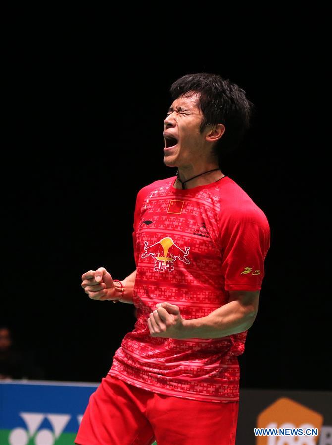 China's Tian Houwei reacts after winning the men's singles second round match with Sameer Verma of India at the 2016 YONEX All England Open Badminton Championships in Birmingham, Britain on March 10, 2016. 