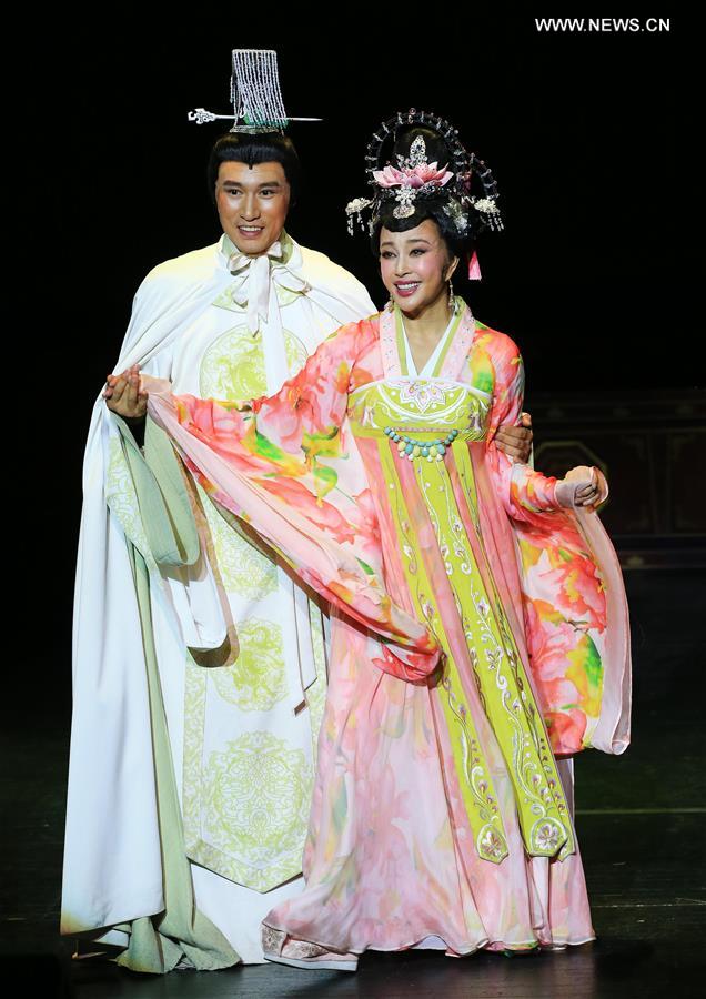 Actress Liu Xiaoqing (R) and actor Zhang Wenming perform in the large-scale legendary play 'Empress Wu Zetian' at Metro Toronto Convention Centre's John Bassett Theatre in Toronto, Canada, March 11, 2016. 