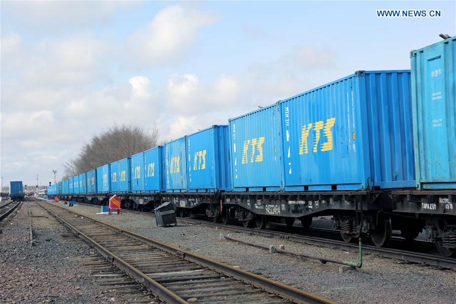 The Chang'an cargo train leaves the train station at the town of Dostyk, Kazakhstan, March 20, 2016.